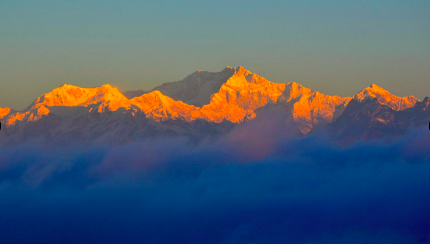 you can see the peaks of Kanchenjunga illuminate before the sun is seen at lower elevationsTiger Hill is located in Darjeeling
